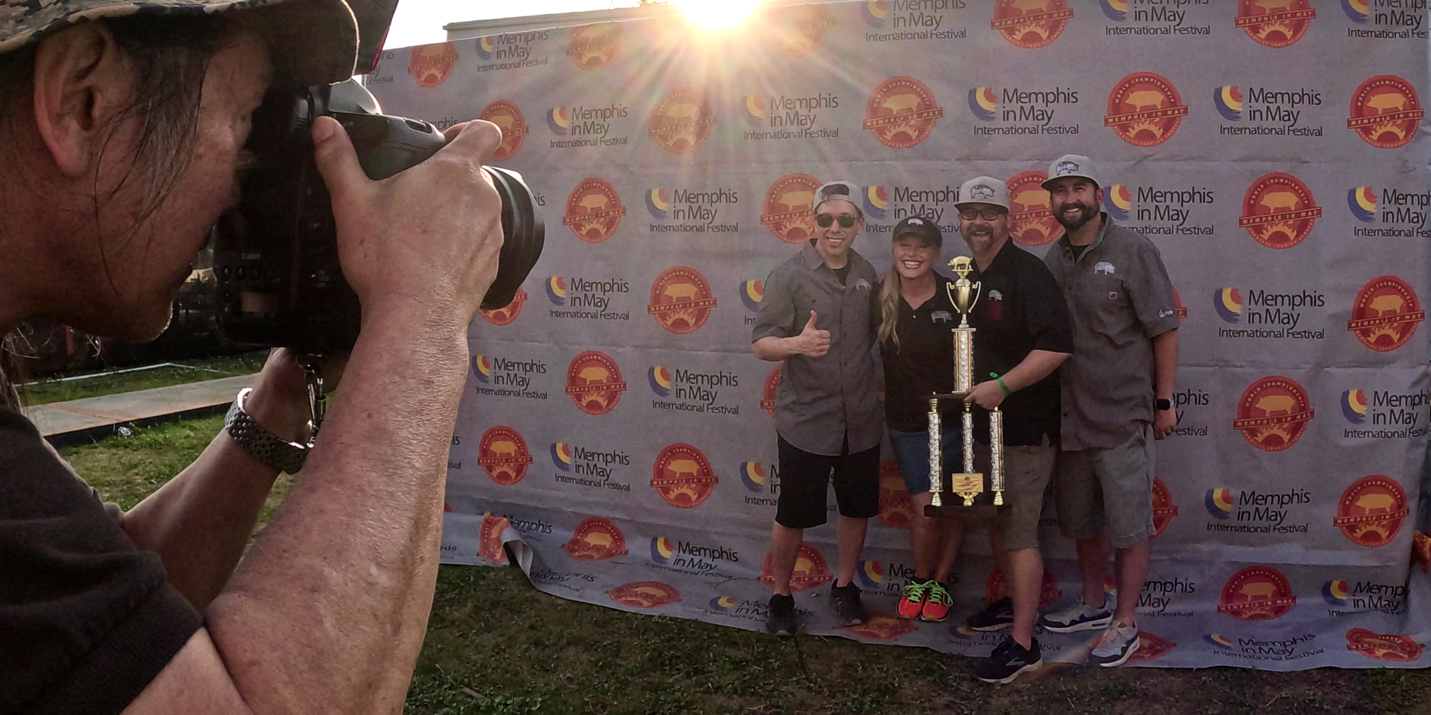 Burnt Finger BBQ holding Memphis in May seafood trophy